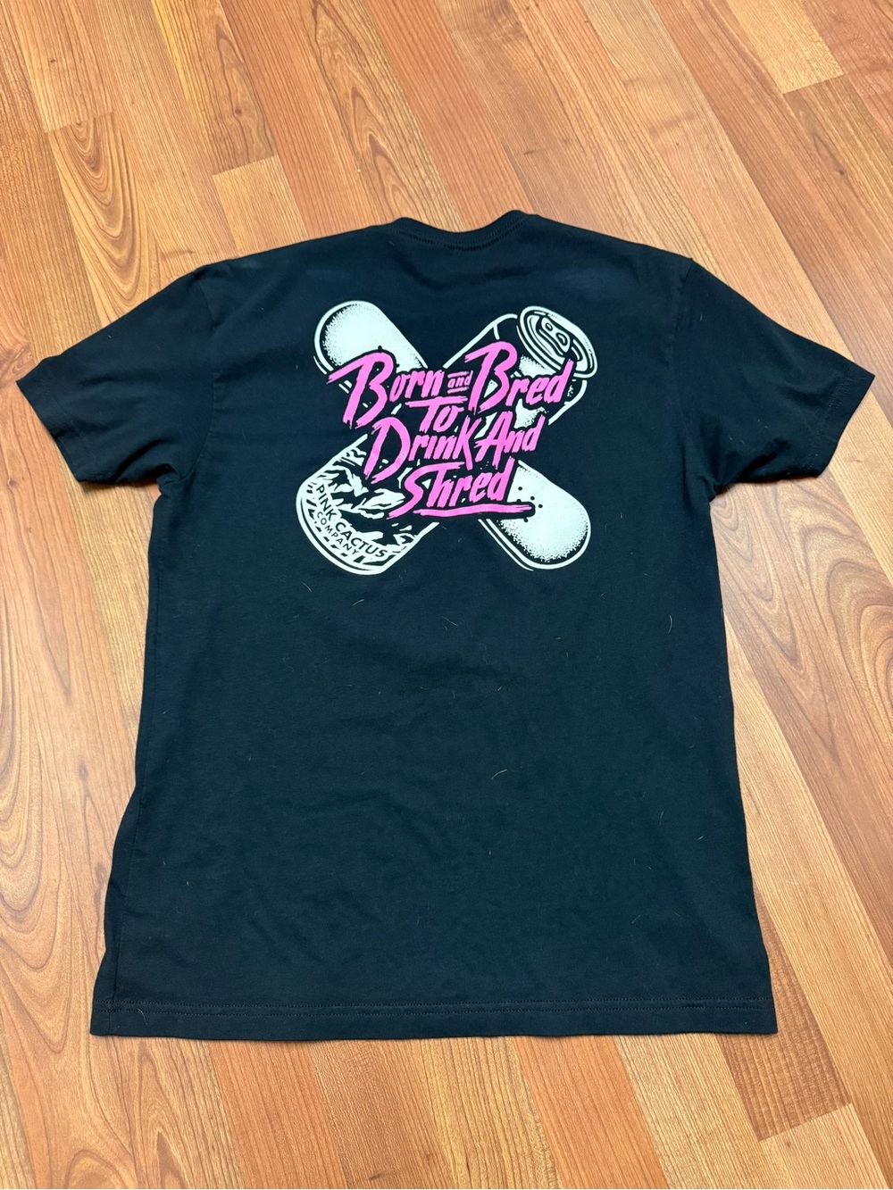 Men's Black Graphic Tee with Pink 'Born and bred to Drink and Shred' Print